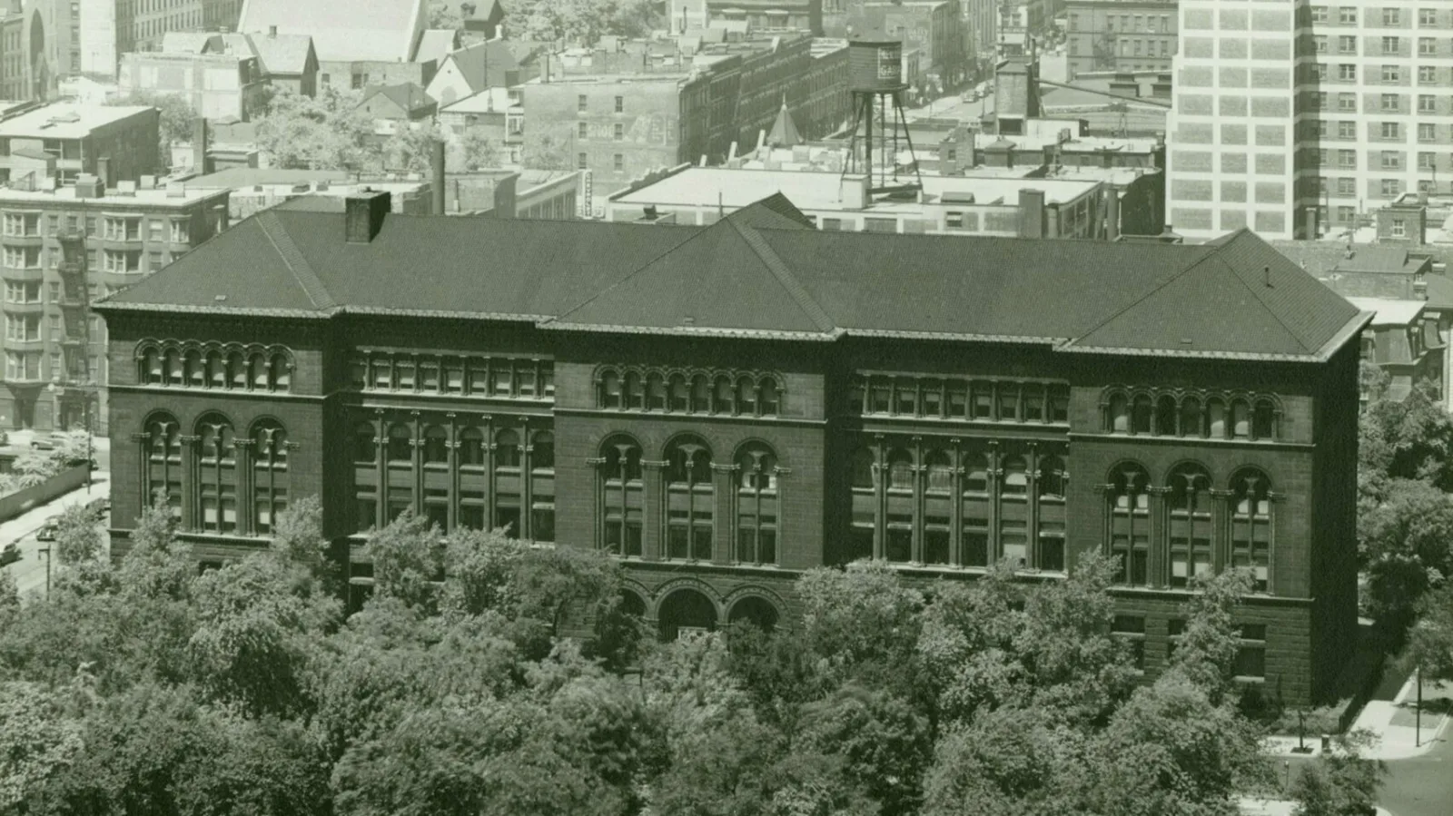 An aerial photo shows the Newberry rising above Washington Square Park.