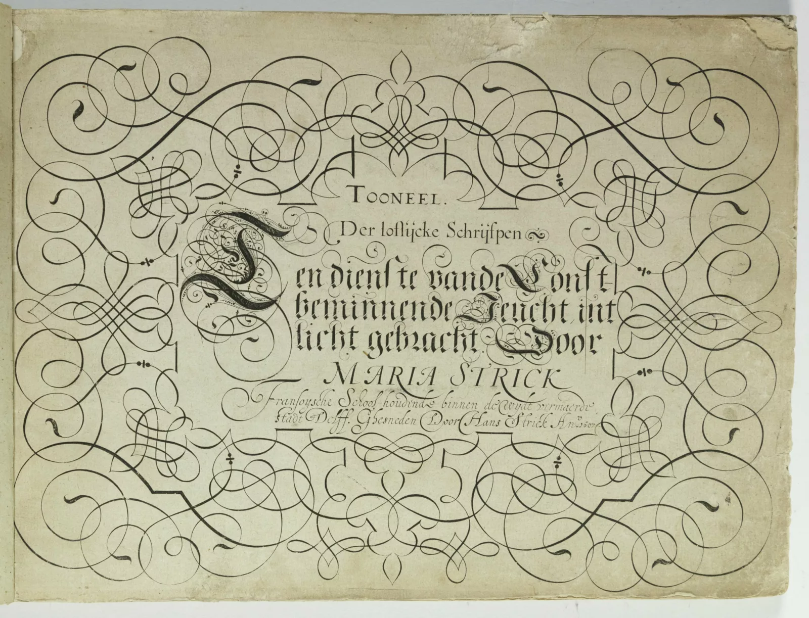 Calligraphic writing appears in the middle of the page. Under the writing are the words “Maria Strick.” Surrounding the handwriting are loops and flourishes.