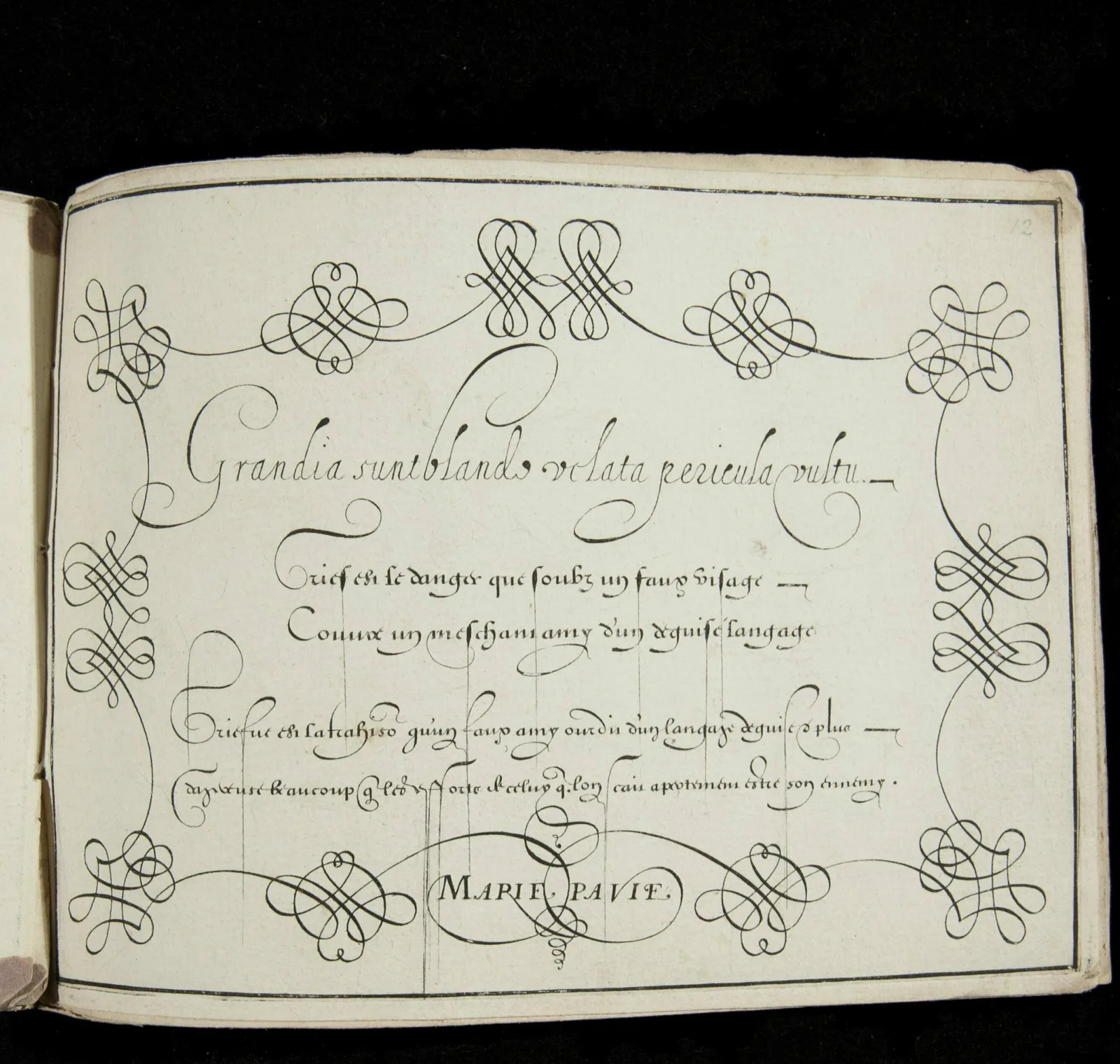 Marie Pavie handwriting Neat, flowing handwriting appears on a page. Below the writing are the words “Marie Pavie.”