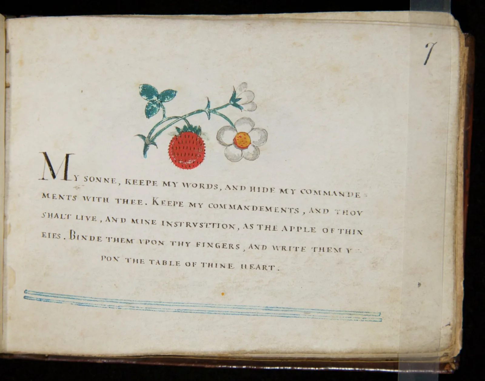 Handwritten words appear on a page. The words are “My sonne, keepe my words, and hide my commandements with thee.” Above the words is a hand-drawn flower.