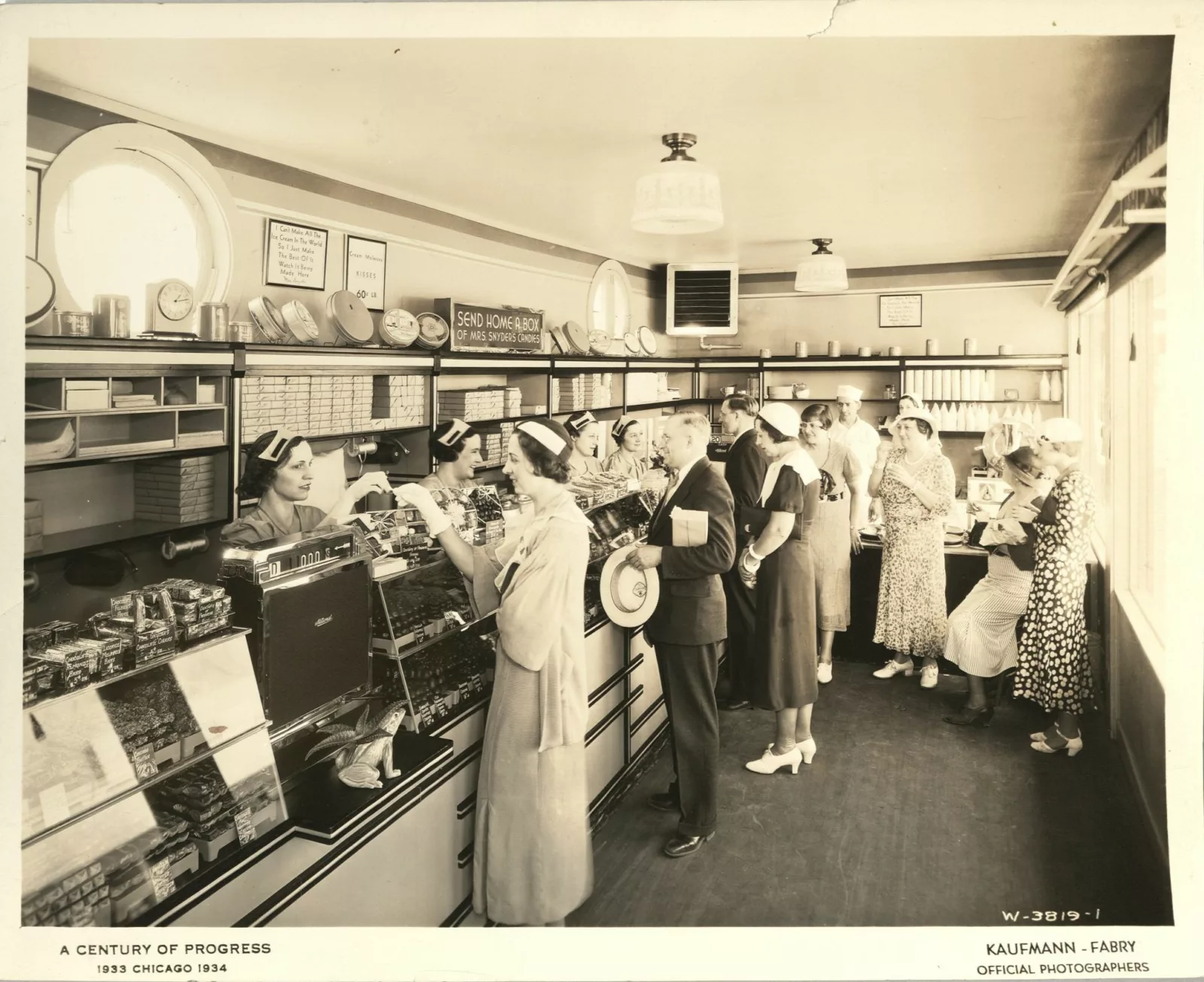 Shoppers line up to buy candy at a Mrs. Snyder's store.