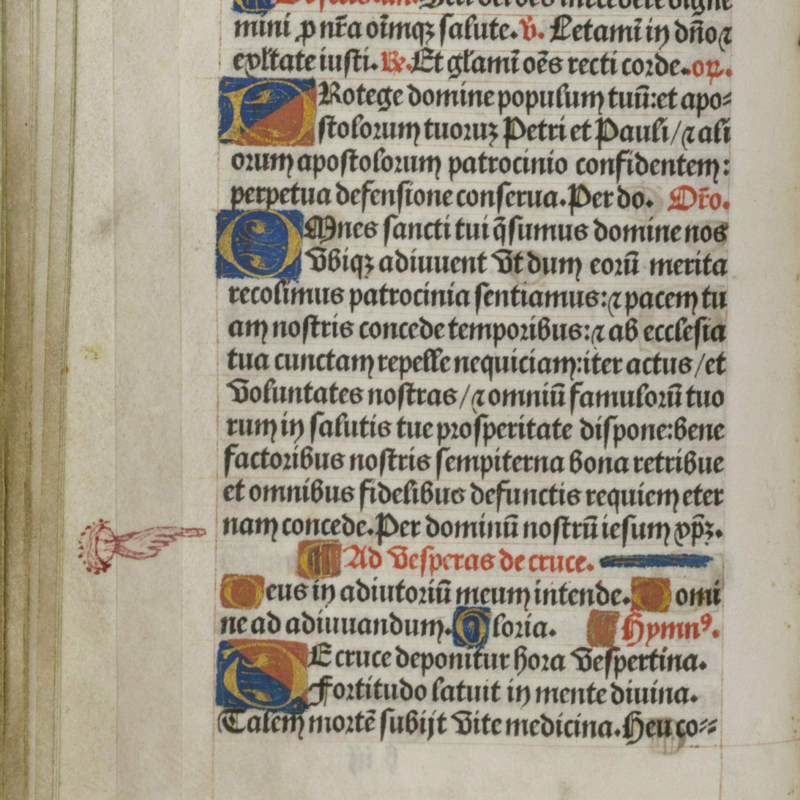 A hand drawn in the margins of a book highlights important text.